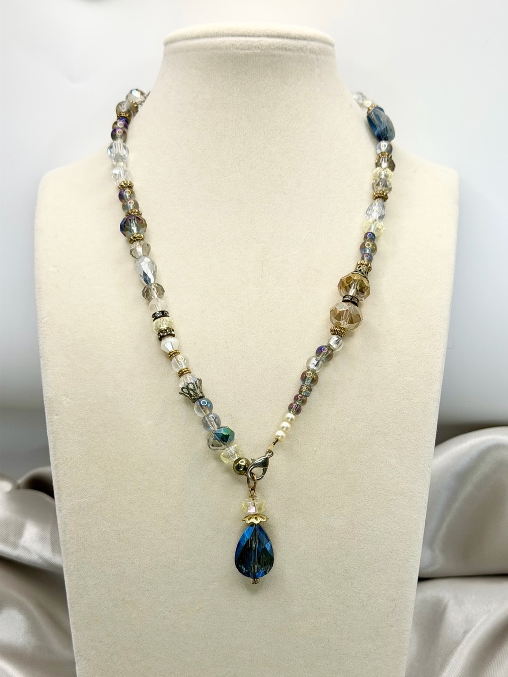 Crystal Bead Necklace with Blue Teardrop Pendant